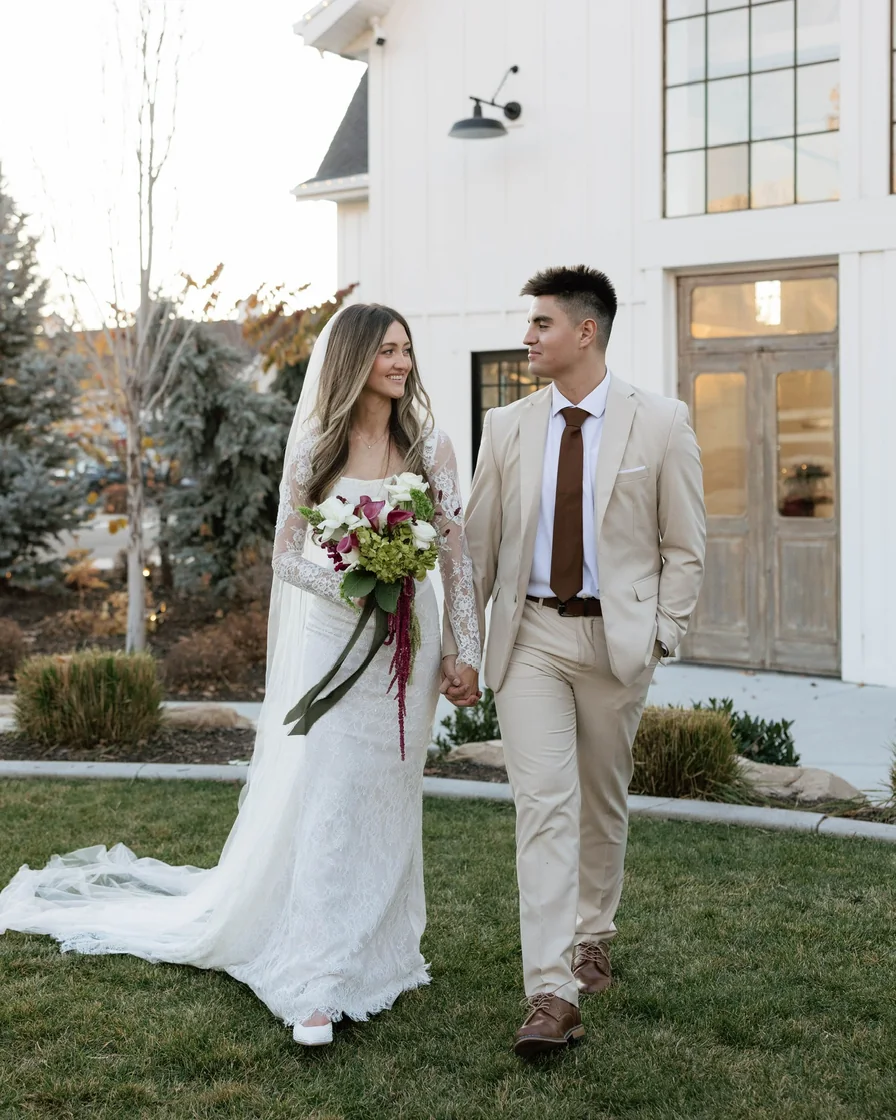 Marco Pierce and his wife walking together outdoors